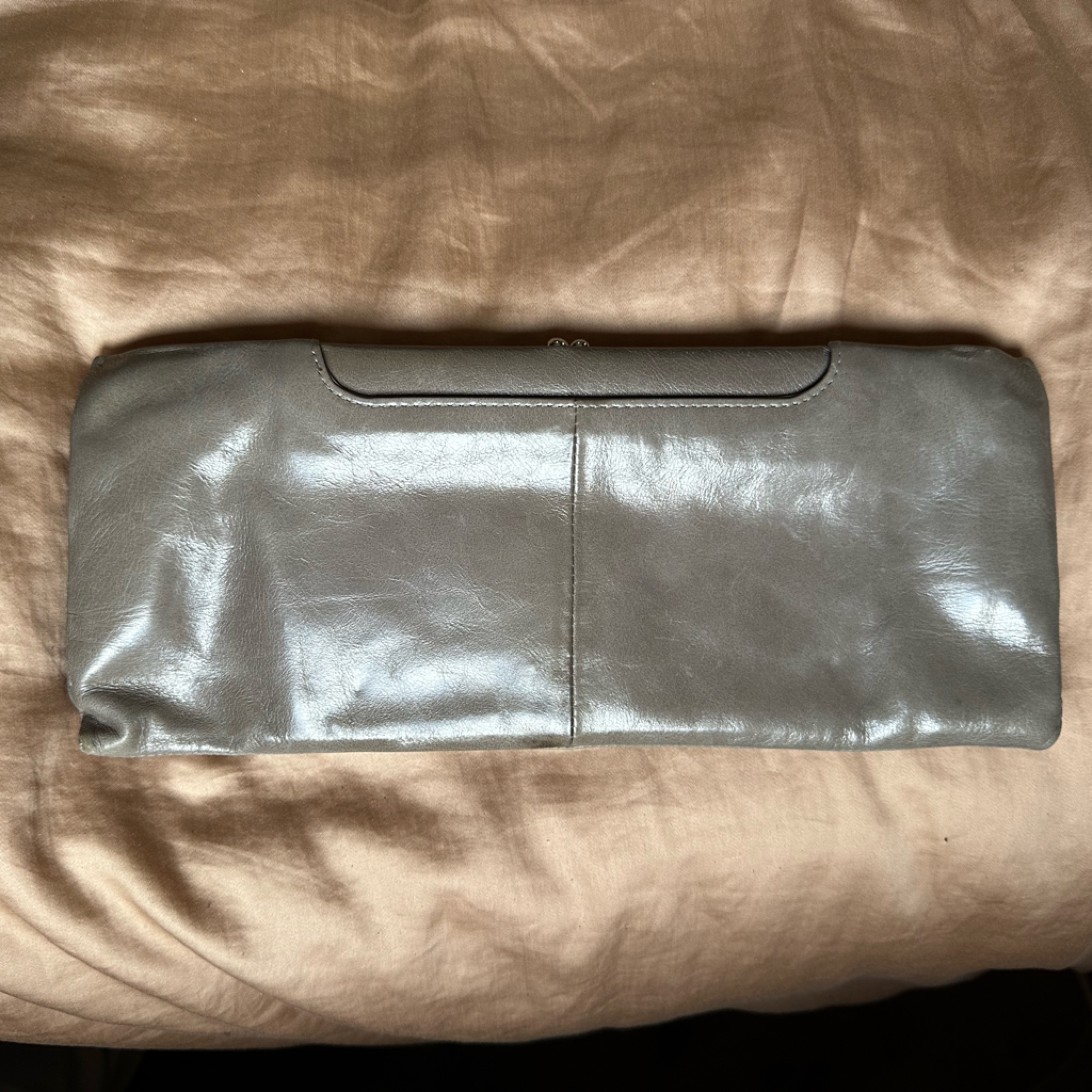 Hobo Grey Leather Clutch With Orange And Teal Patterned Lining